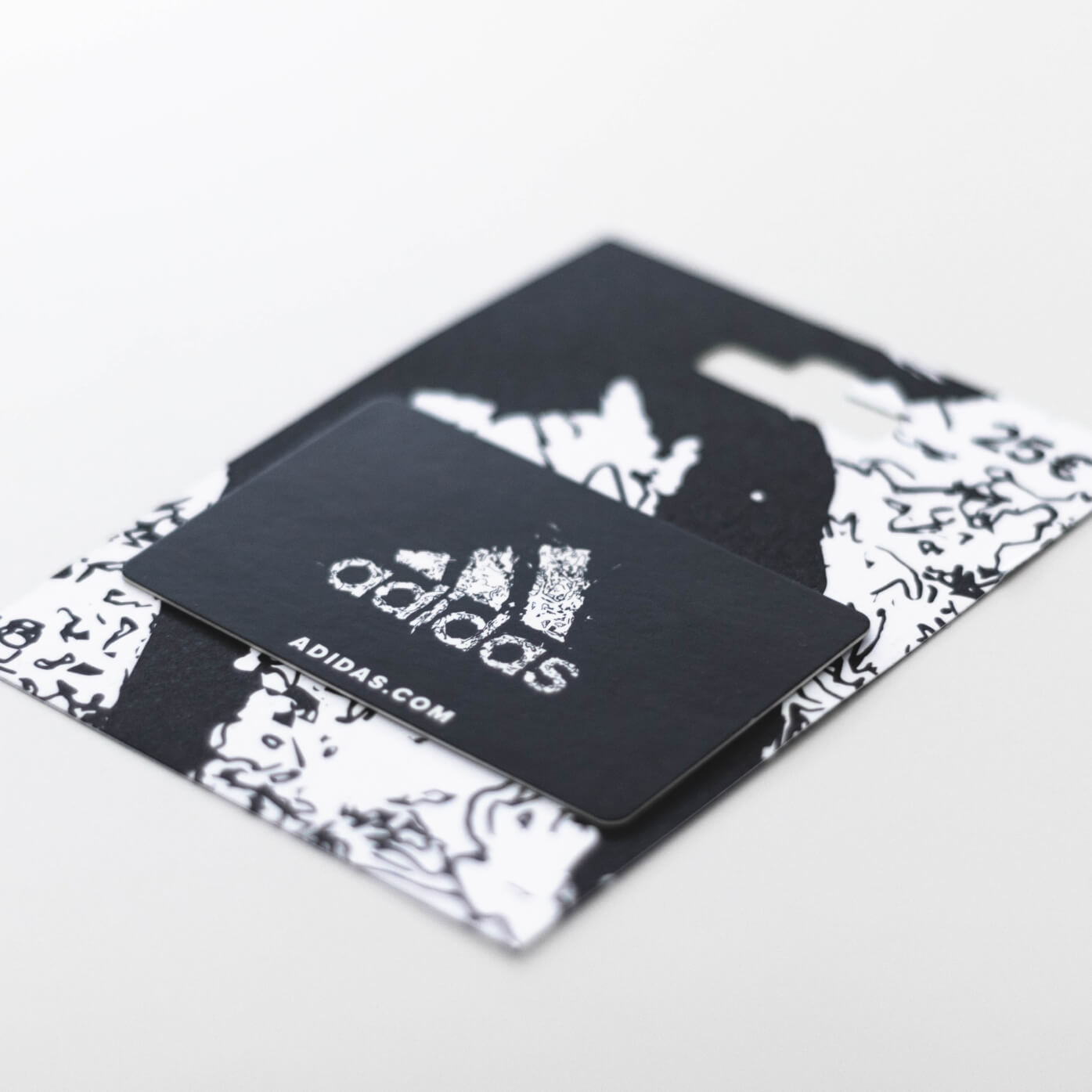 adidas giftcard in black & White